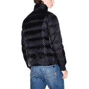 Black quilted down jacket with high collar and ribbed cuffs.