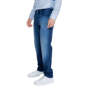 Blue denim jeans with white stitching and a slim fit design.