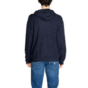 Navy blue hooded sweater with intricate lace detailing and ribbed knit texture.