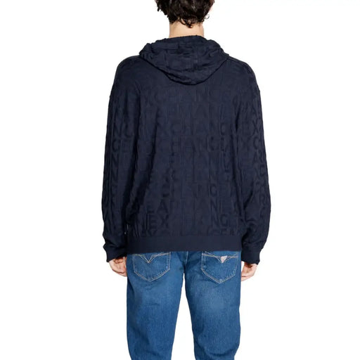 Navy blue hooded sweater with intricate lace detailing and ribbed knit texture.