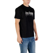 Men’s black cotton crew neck short-sleeve T-shirt with white graphic design by Armani Exchange