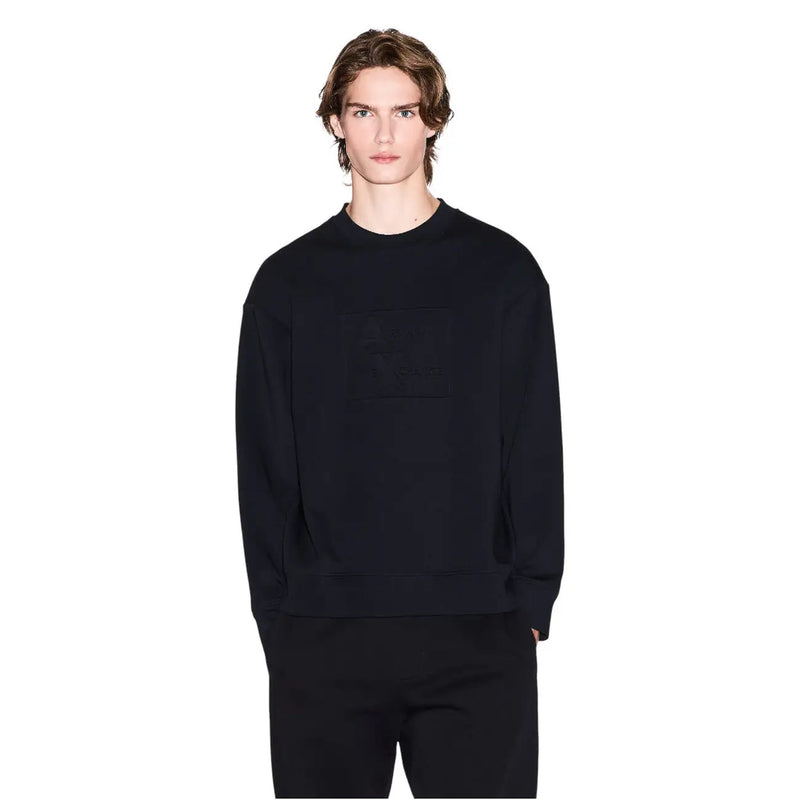 Armani exchange Sweat-shirt oversize en coton noir pour homme, col rond, avec poche avant discrète et coupe décontractée.