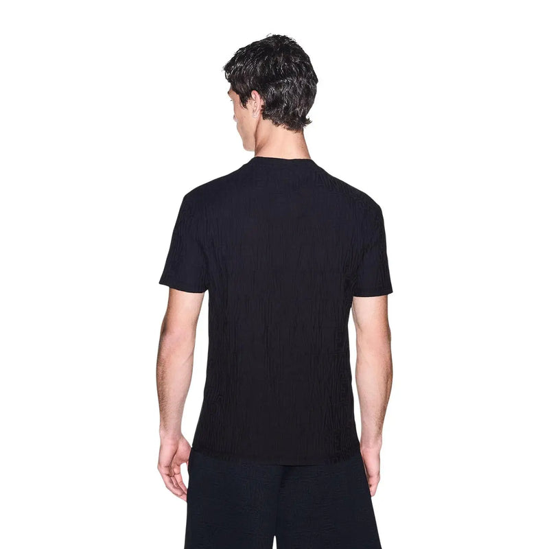 Armani Exchange T-shirt noir en coton pour homme, à manches courtes et à texture côtelée discrète.