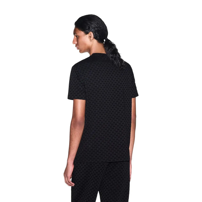 Armani Exchange T-shirt noir en coton pour homme, à manches courtes, avec un motif discret et répétitif.