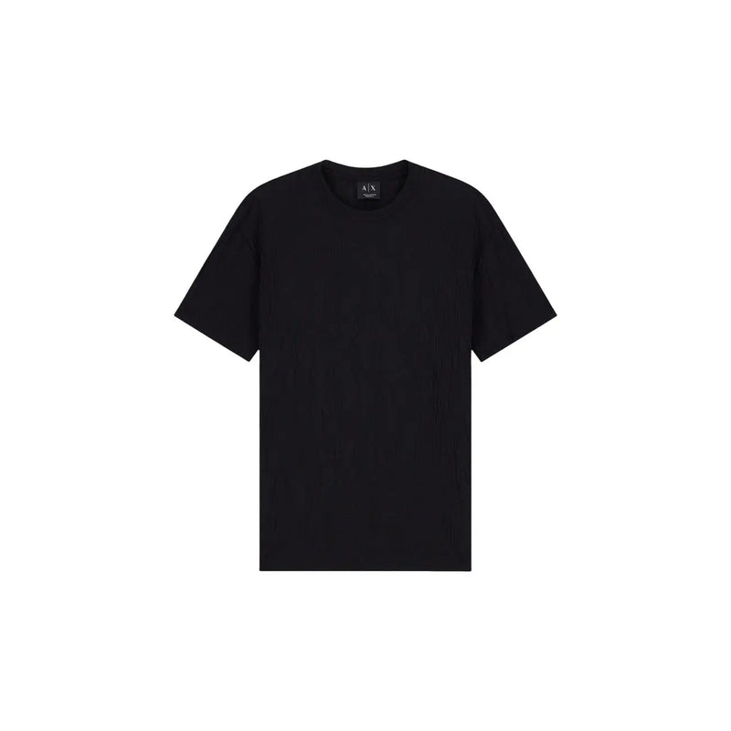 Armani Exchange T-shirt noir en coton pour homme, manches courtes, col rond, design minimaliste et étiquette de marque discrète au niveau du col.