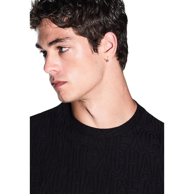 Armani Exchange T-shirt noir en coton pour homme avec lettrage en relief et motif en tissu texturé