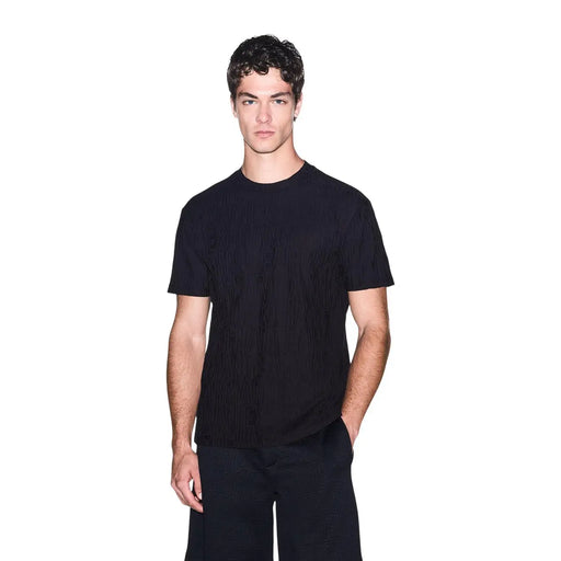 Armani Exchange T-shirt noir en coton pour homme, à manches courtes et à motif côtelé discret, idéal pour un style décontracté.