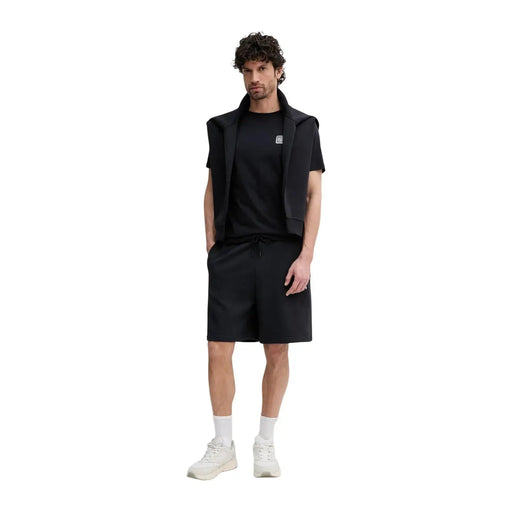 Armani Exchange Blazer sans manches en coton noir pour homme, col structuré et logo discret sur la poitrine