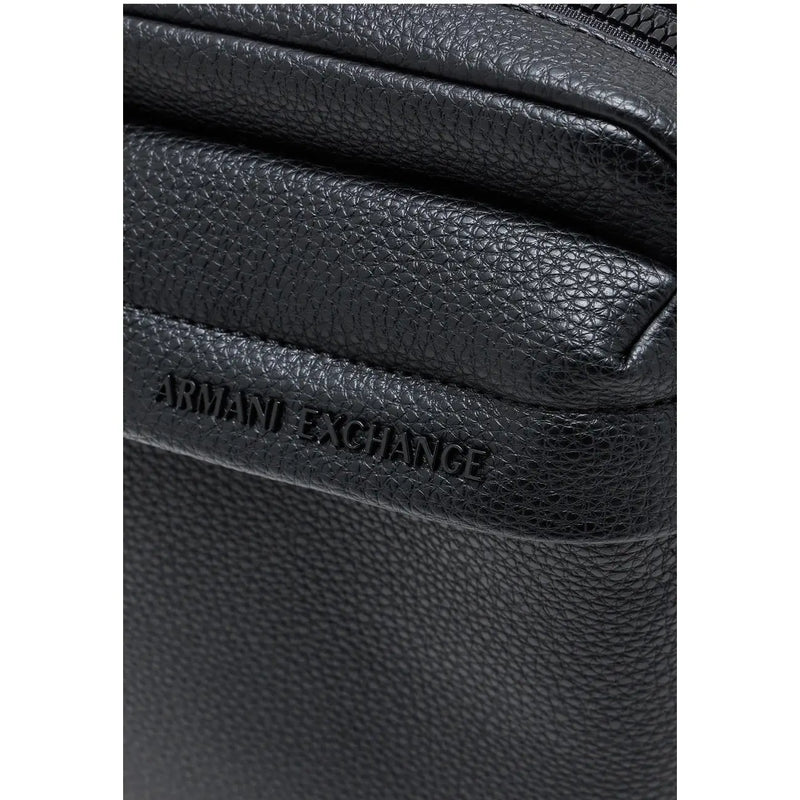 Armani Exchange Sac bandoulière homme en cuir texturé noir avec logo en relief et poches zippées, largeur 16 cm