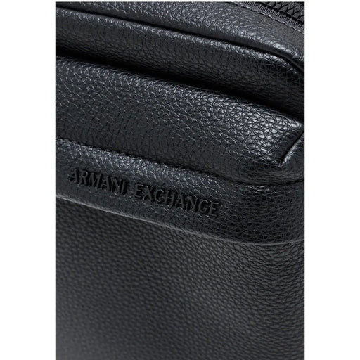Armani Exchange Sac bandoulière homme en cuir texturé noir avec logo en relief et poches zippées, largeur 16 cm