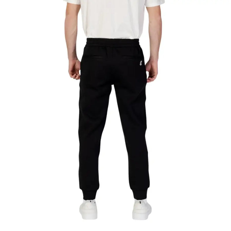 Armani Exchange men black plain laced jogger pants with drawstring waistband and ribbed cuffs in cotton blend