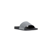 Armani Exchange Sandales noires pour homme avec bride tissée texturée argentée en PVC.