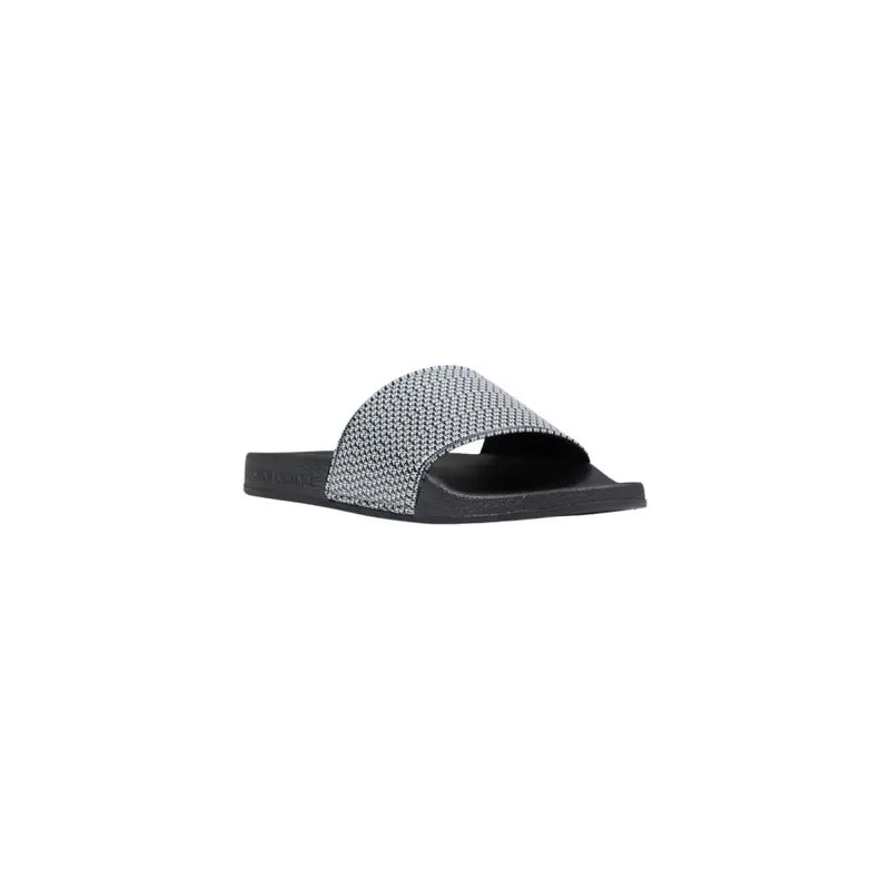 Armani Exchange Sandales noires pour homme avec bride tissée texturée argentée en PVC.
