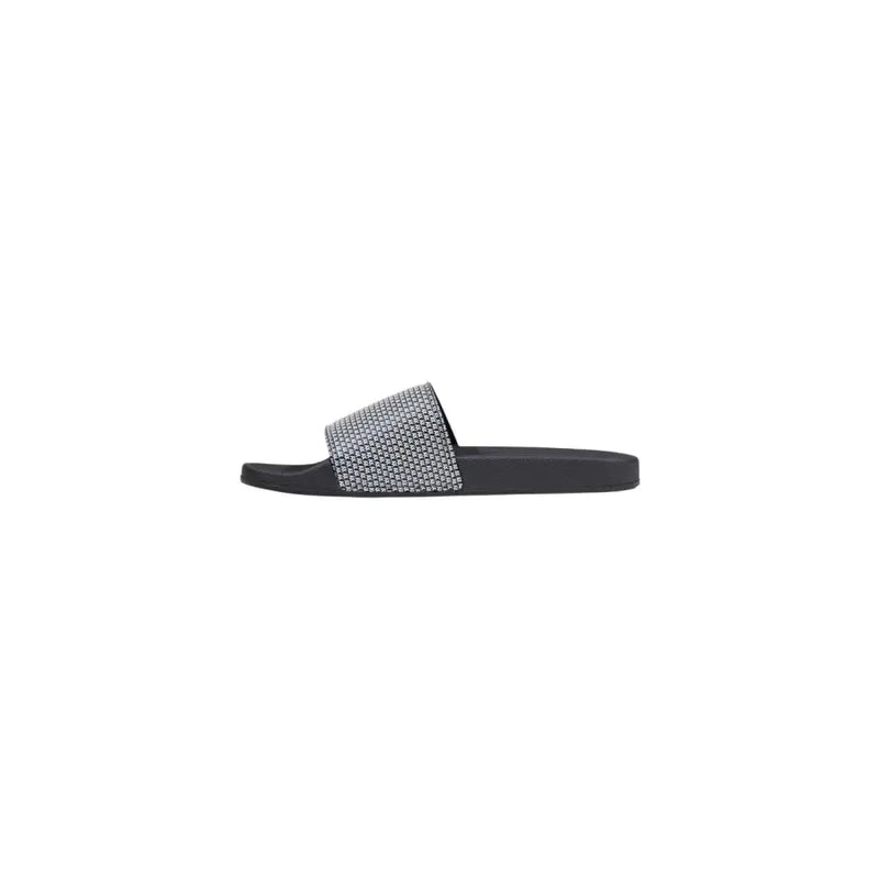 Armani Exchange Pantoufles pour hommes en PVC noir imprimé avec bride texturée à motifs et petits clous métalliques