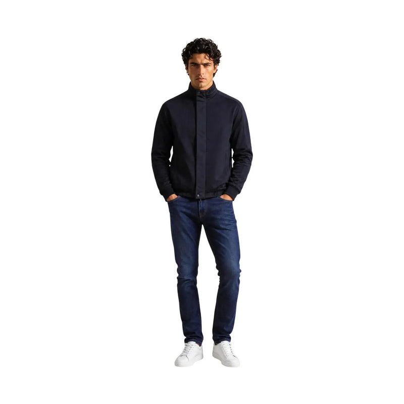 Armani Exchange Veste zippée bleu marine pour homme en mélange de coton, col montant et design moderne et élégant.