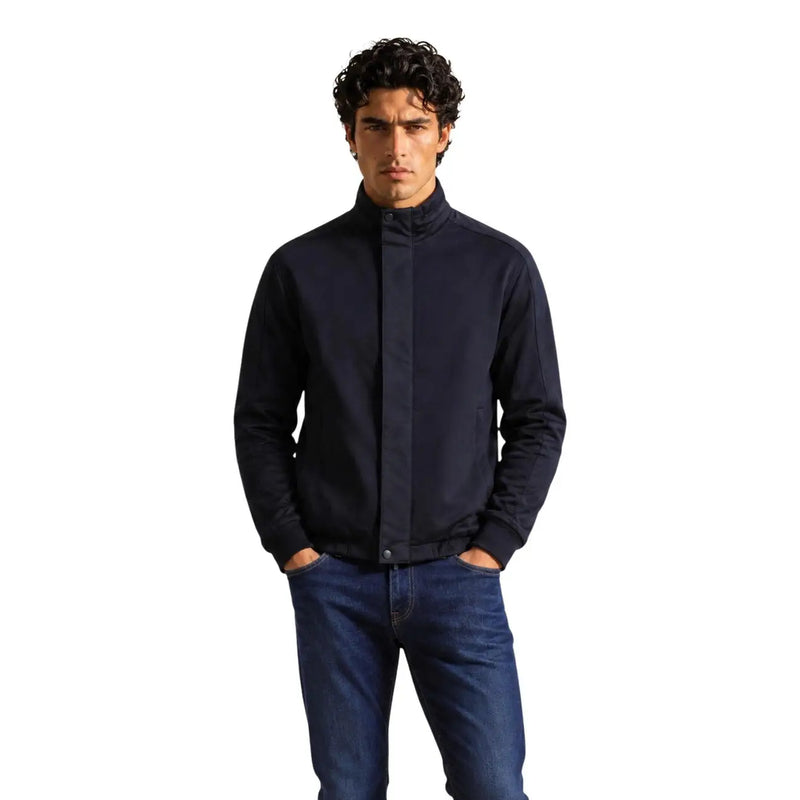 Armani Exchange Sweat à capuche bleu marine en mélange de coton pour homme, avec veste zippée bleu marine, col montant et détails de coutures discrets.