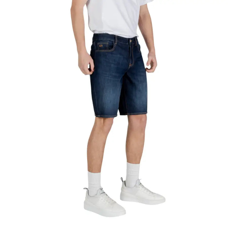 Armani Exchange men blue cotton shorts featuring dark blue denim with classic five-pocket design and subtle fading