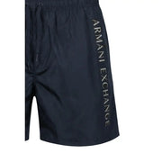 bleu marine foncé armani exchange Maillot de bain homme en polyester avec logo vertical imprimé sur le côté, conçu pour la natation.