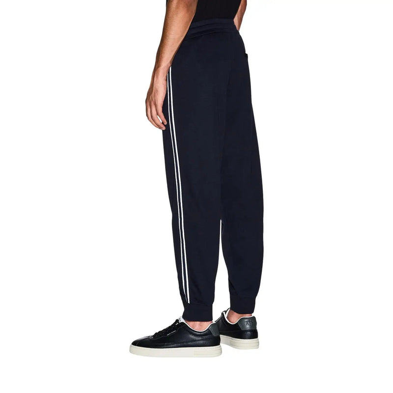 Armani Exchange Pantalon de jogging bleu marine pour homme, en mélange de polyester, avec deux bandes blanches sur chaque jambe.
