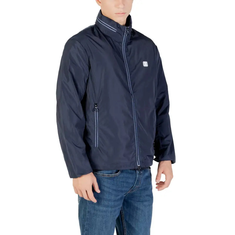 Armani exchange men blue zip blazer is a navy lightweight polyester jacket with white zipper trim and logo patch on chest