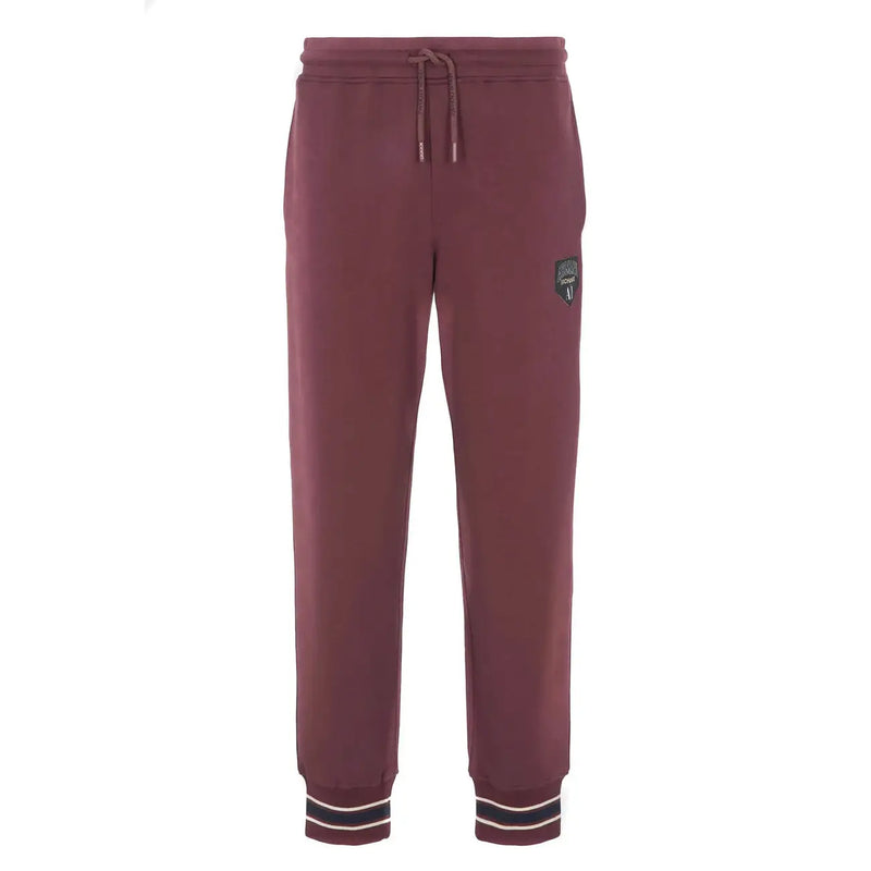 Armani Exchange Pantalon homme en coton bordeaux, doublé polaire bordeaux, avec taille élastiquée à cordon et ourlets rayés.