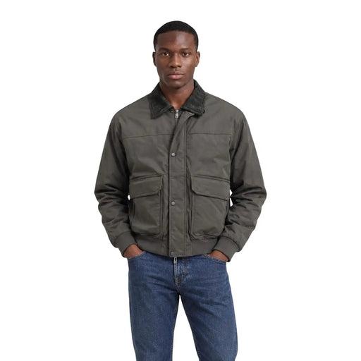 Armani Exchange Blazer vert olive en polyester pour homme, style veste matelassée, col foncé et poches à rabat sur le devant.