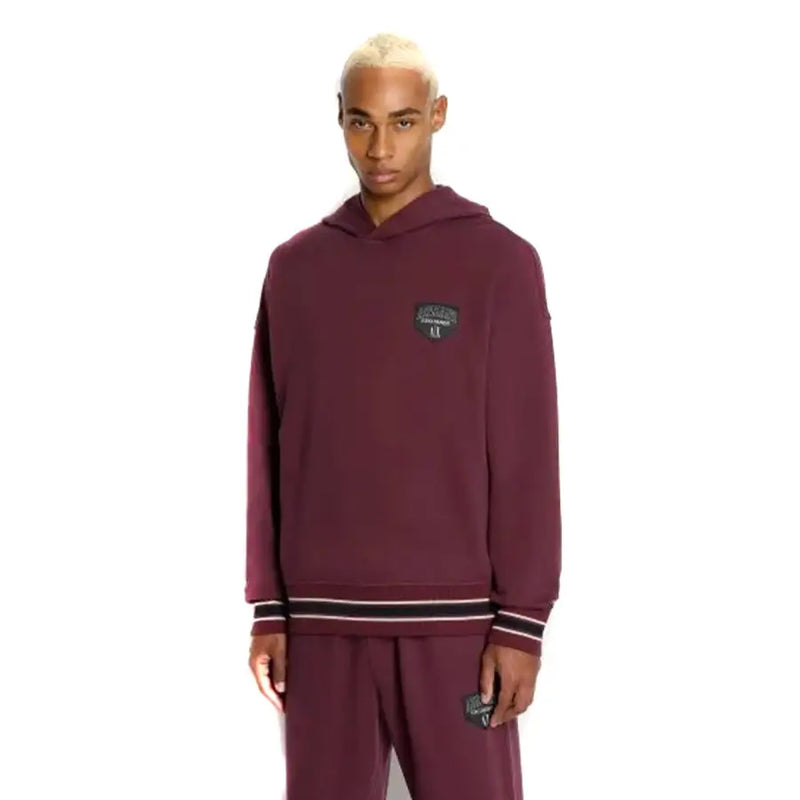 Armani Exchange men hooded bordeaux sweatshirt with front pockets featuring maroon puma hoodie and striped cuffs