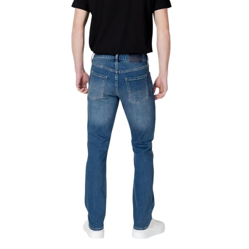 Armani Exchange Jean homme bleu en coton stretch coupe slim avec délavage subtil, vue arrière avec poches classiques