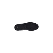 Semelle en caoutchouc noir avec motif à chevrons et étiquette centrale armani exchange Baskets en cuir noir pour homme