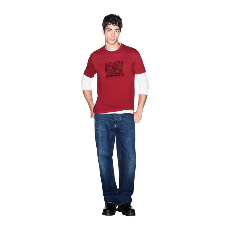 Armani Exchange T-shirt rouge en coton pour homme, avec une doublure blanche et un imprimé noir sur la poitrine.