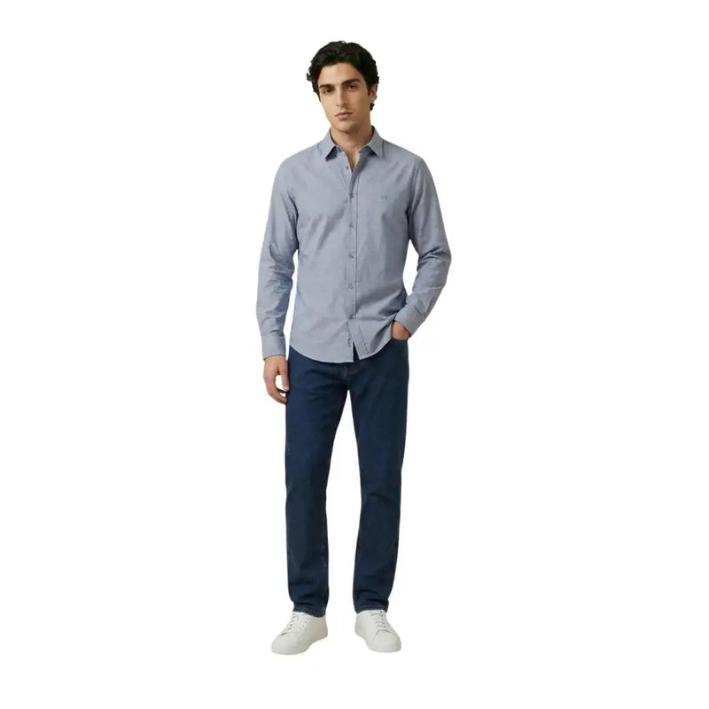 Armani Exchange Chemise homme bleu clair à la texture subtile, manches longues et logo brodé sur la poitrine gauche