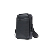Armani Exchange Sac bandoulière homme en cuir noir texturé, au design minimaliste et élégant, avec bandoulière ajustable.