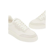Armani Exchange Baskets blanches à lacets pour homme en polyuréthane, au design minimaliste épuré et aux coutures contrastées discrètes.