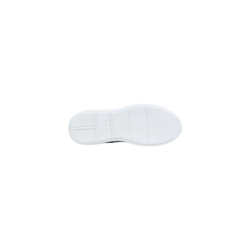 White rubber sole with minimalist design and subtle embossed branding on armani exchange men sneakers white leather sport slip