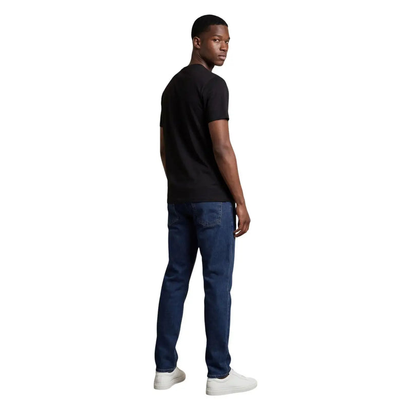 Dark blue denim jeans with classic fit and subtle stitching from armani exchange men t shirt collection