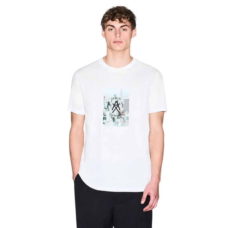 Armani Exchange T-shirt noir en coton pour homme, col rond, taille M, avec imprimé graphique blanc représentant des bâtiments de la ville et un logo.