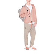 Armani Exchange T-shirt pour homme assorti à un sweat à capuche zippé rose clair texturé, avec cordon de serrage assorti et poignets côtelés.