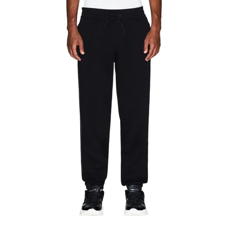 Armani Exchange Pantalon de jogging noir en coton pour homme, avec taille élastiquée à cordon et ourlets resserrés, idéal pour une tenue décontractée.