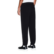 Armani Exchange Pantalon de jogging noir en coton pour homme, coupe décontractée et ourlets élastiques, idéal pour un style décontracté.