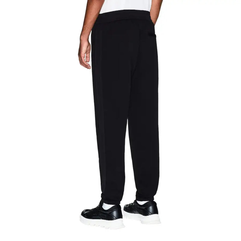Armani Exchange Pantalon de jogging noir en coton pour homme, coupe décontractée et ourlets élastiques, idéal pour un style décontracté.