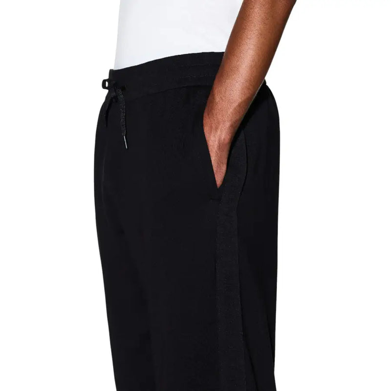 Armani Exchange Pantalon de sport noir pour homme, avec taille élastiquée à cordon et détails de coutures latérales.