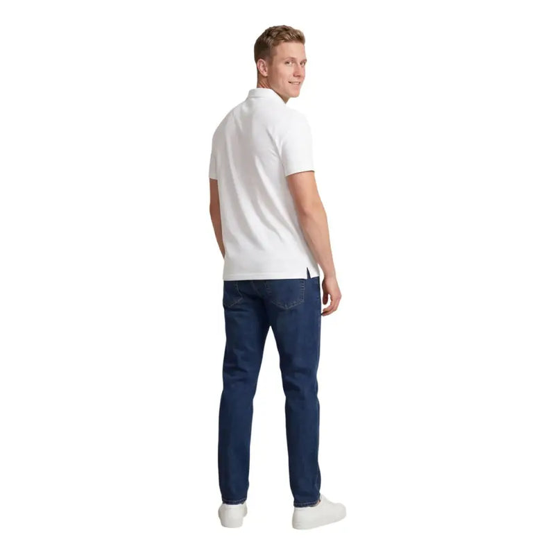 Armani Exchange Polo blanc en coton à manches courtes pour homme, avec col classique et coutures soignées.