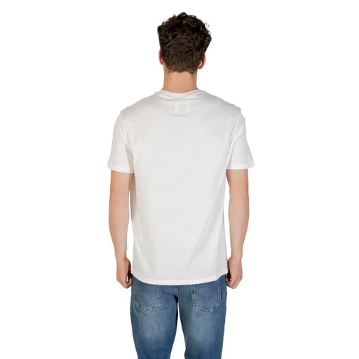 Armani Exchange Men White Cotton Short Sleeve Round Neck T Shirt on a model