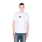 Armani Exchange T-shirt blanc en coton pour homme, orné d'un logo discret noir et argent sur la poitrine.