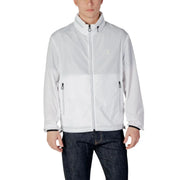 Armani Exchange Blazer blanc zippé pour homme en polyester, avec un design color-block discret et des tirettes de fermeture éclair noires.