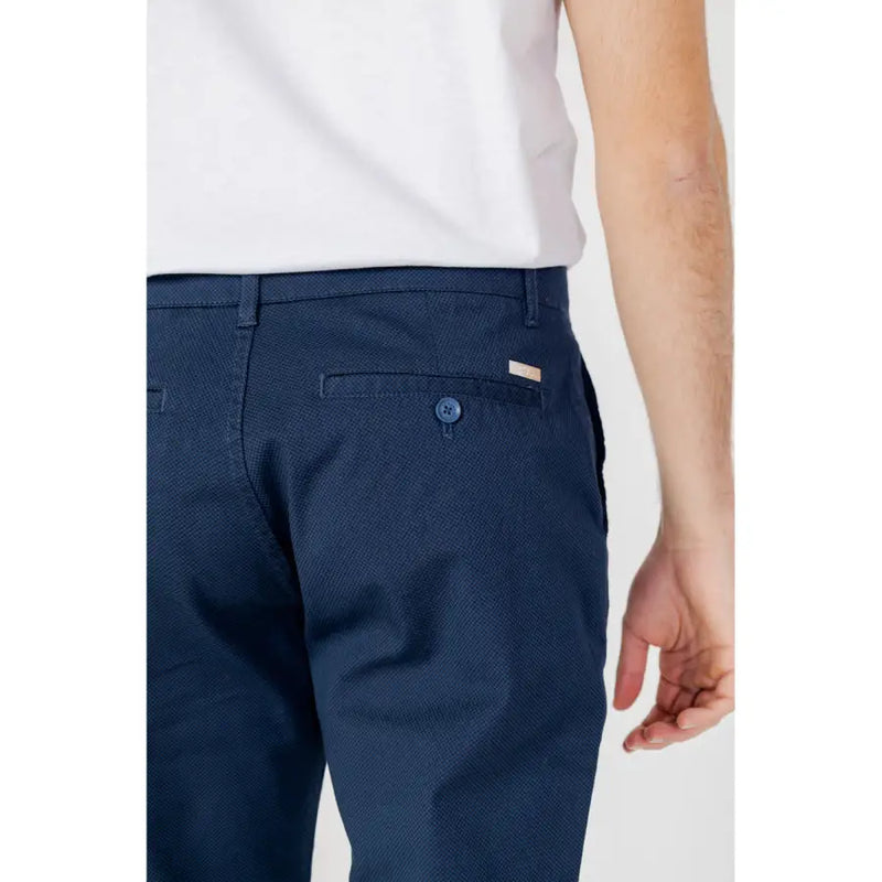 Armani Exchange men’s navy blue textured chino pants with subtle woven pattern and brand tag on back pocket