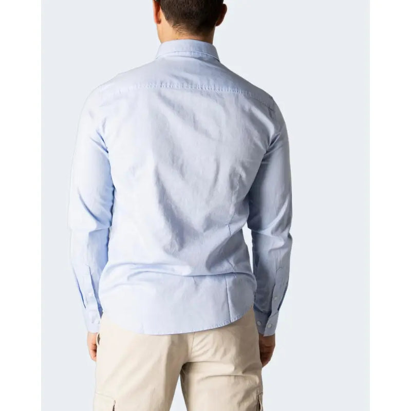 Armani Exchange men’s light blue long-sleeved cotton shirt with classic collar and buttoned cuffs
