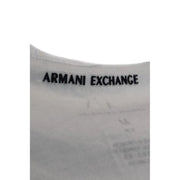 White Armani Exchange garment label with black embroidered branding on the Armani Exchange men’s white printed 100% cotton t-shirt