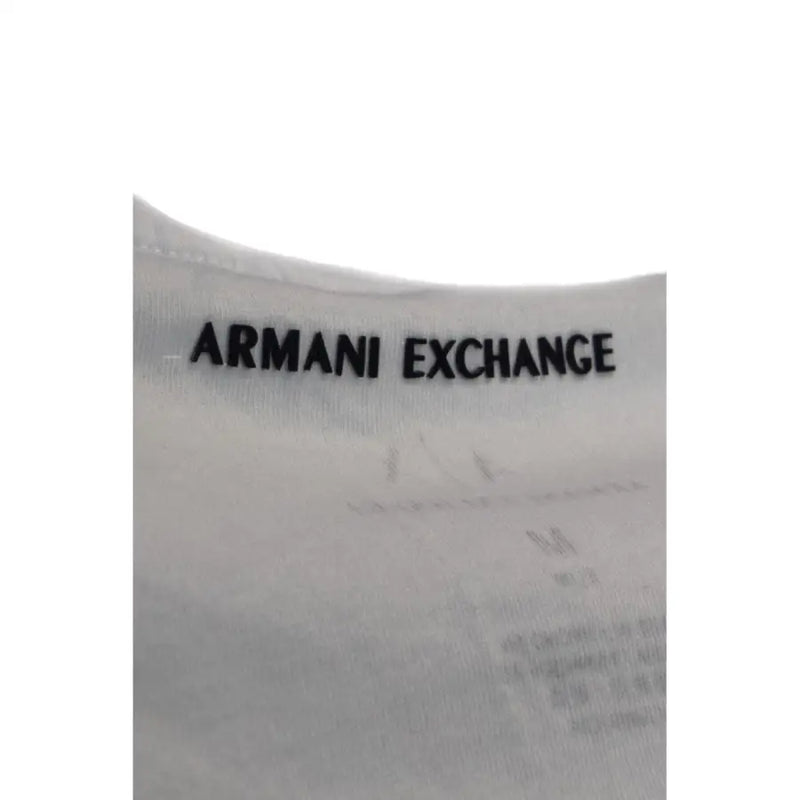 White Armani Exchange garment label with black embroidered branding on the Armani Exchange men’s white printed 100% cotton t-shirt