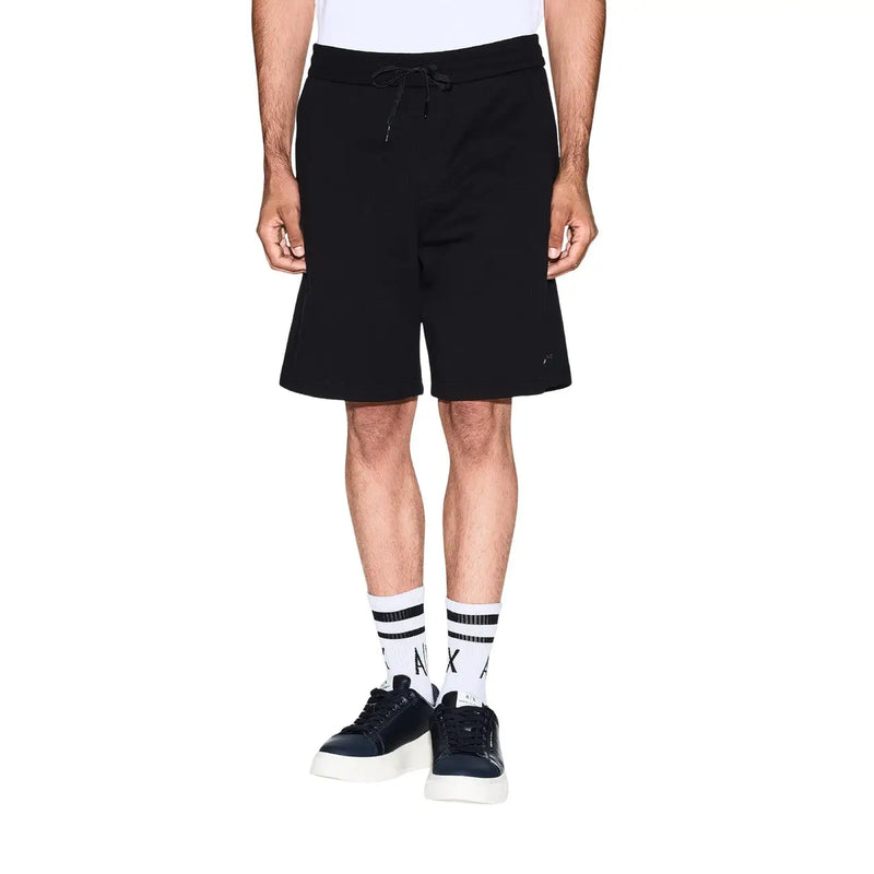 Armani Exchange Short noir pour homme, taille élastiquée avec cordon de serrage et logo discret sur le bas de la jambe droite, vue de face